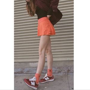 free people movement orange skirt